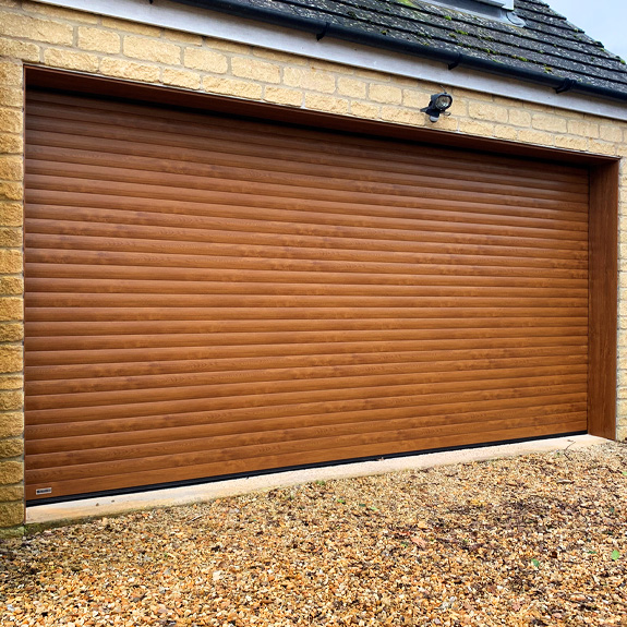 Insulated Electric Roller Door Price Guide from The Garage Door Centre